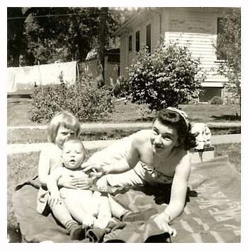 Olive with children in the grass