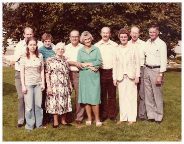 Olives with her brothers and parents